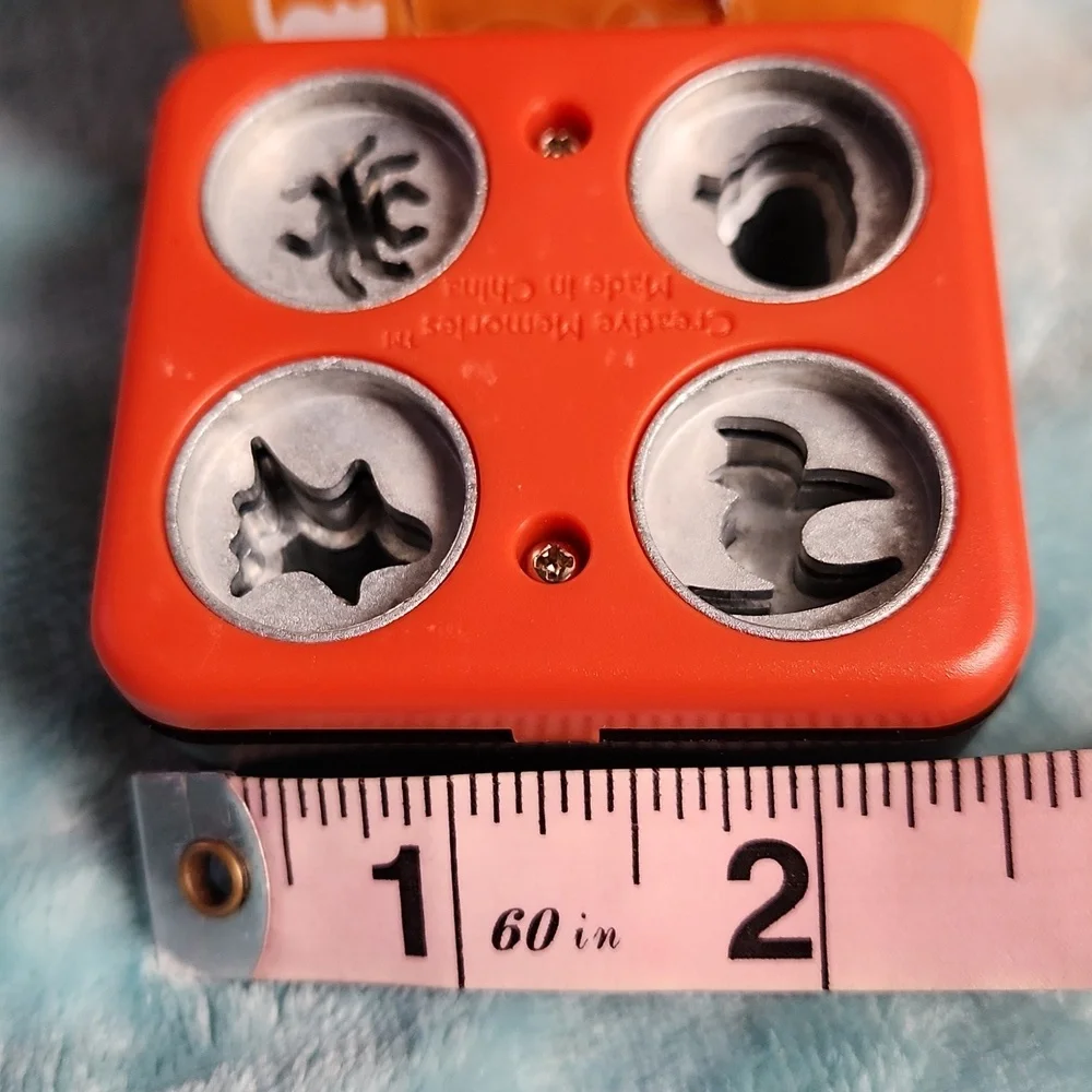 Creative Memories Halloween Micro Maker and 10 sheets of black 8x8 cardstock.
